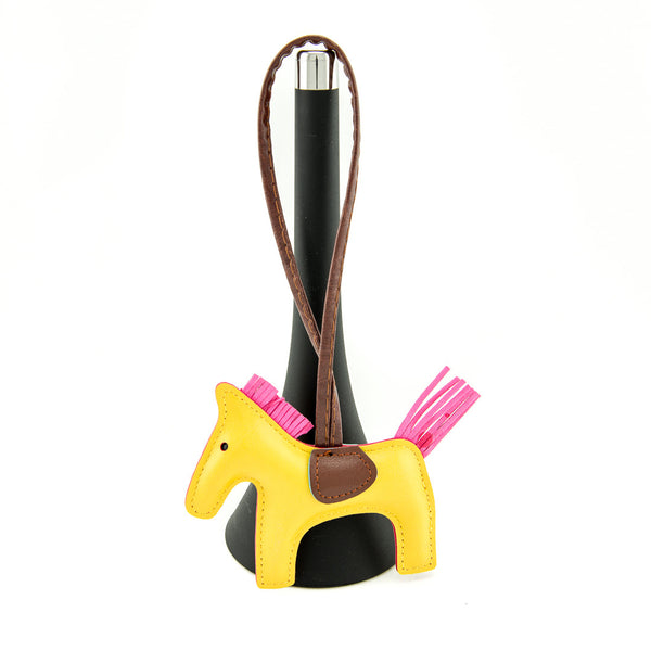 yellow leather pony